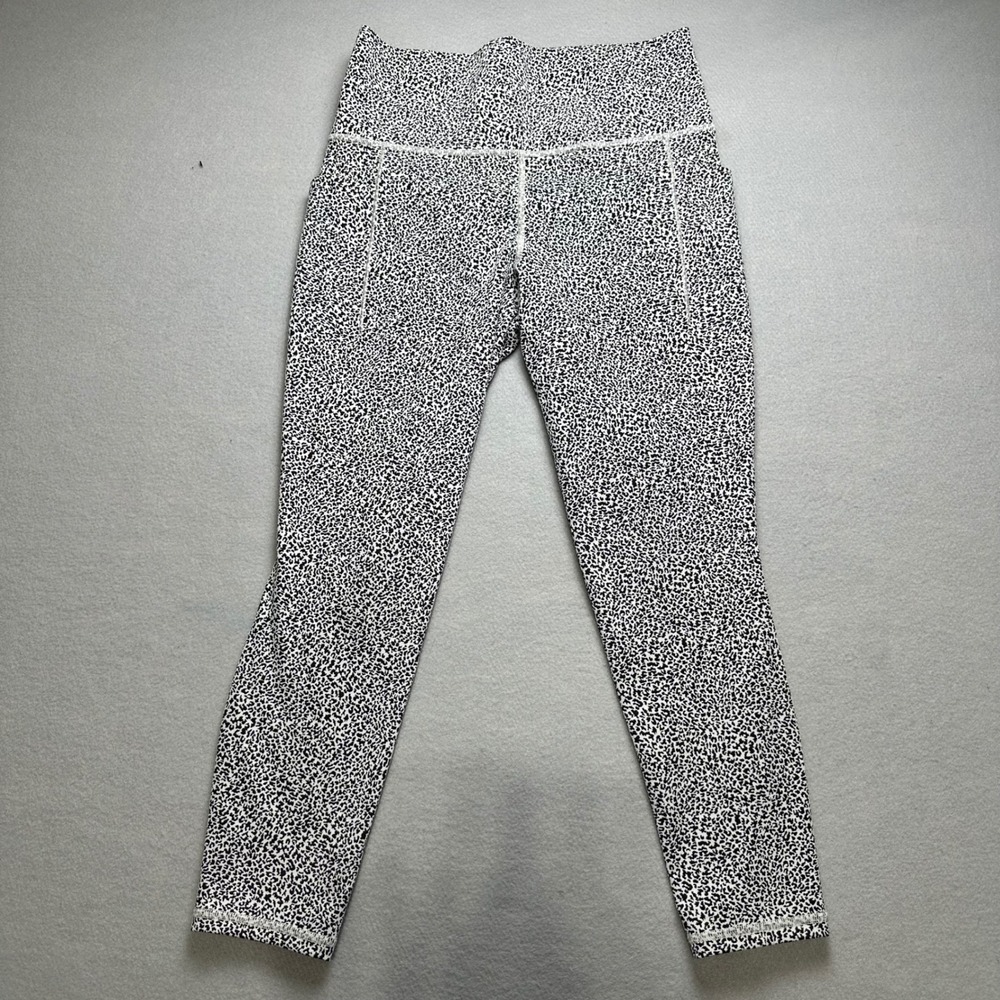 Athleta Salutation Stash II Textured Tight Womens M White Black Cheetah Leggings